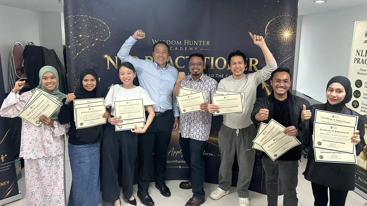 July 2026 NLP Practitioner graduates holding their certificates