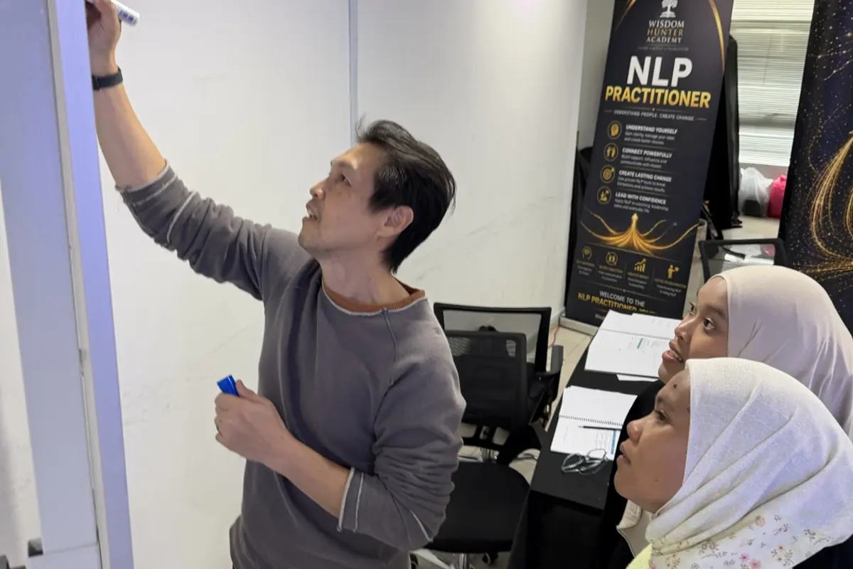 Participants practising NLP tools together during a hands-on exercise